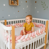 tresse de lit bebe rose blanc bebe dans berceau