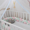    Tresse-de-lit-bebe-rose-banc-vert